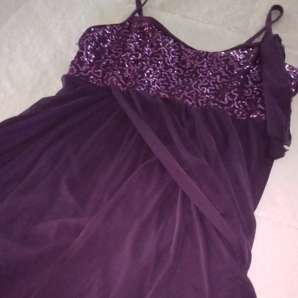 Beautiful purple one piece girls dance costume with built in shorts